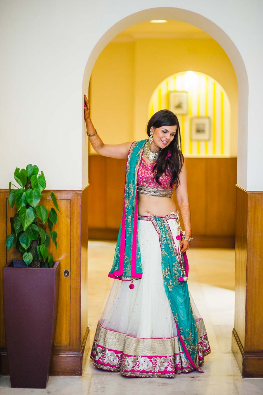 Bride posing in a Delhi Wedding a beautiful Lehenga
